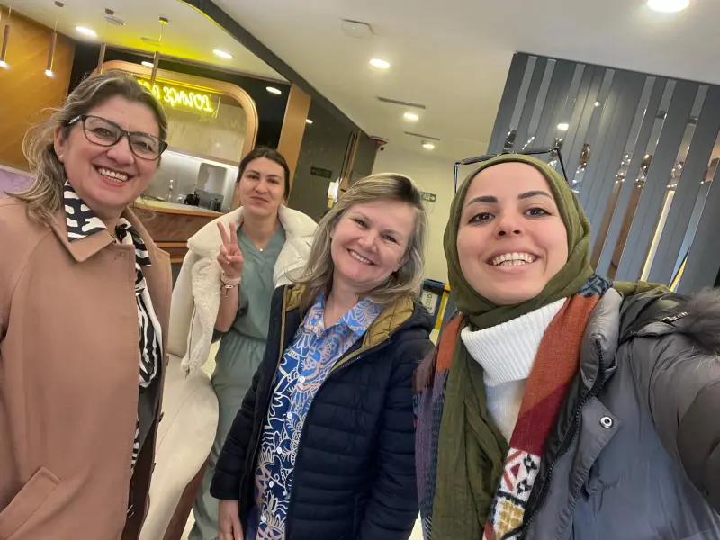 Group Of Happy Patients At Smile Design Clinic